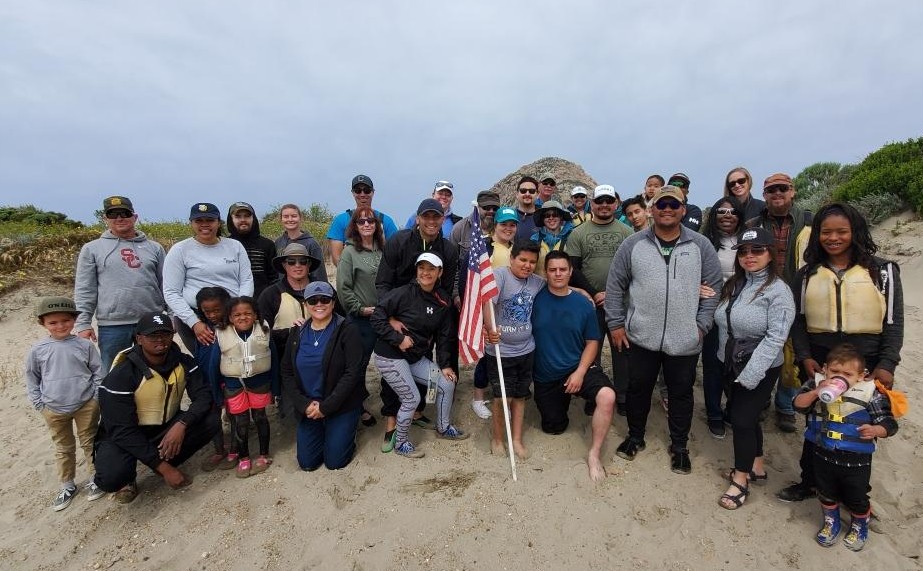 Local Veterans and their families at the beach.  Click to view article, SLO County Veterans Open The Door To Services At Escape Rooms