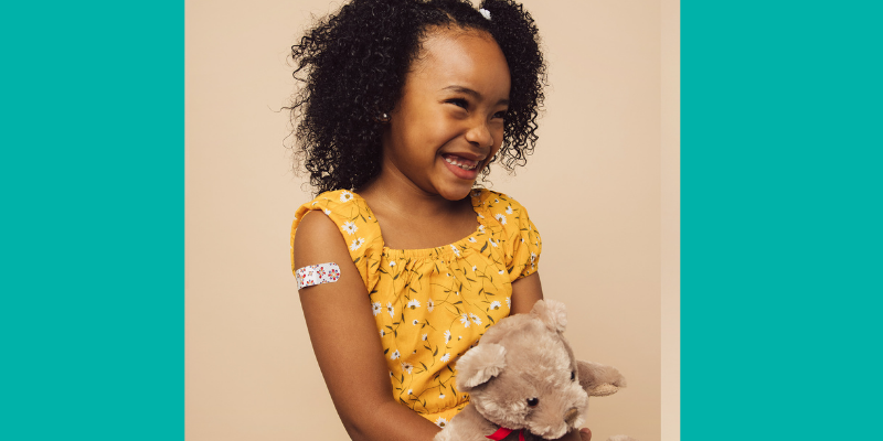 Photo of child with band aid on arm