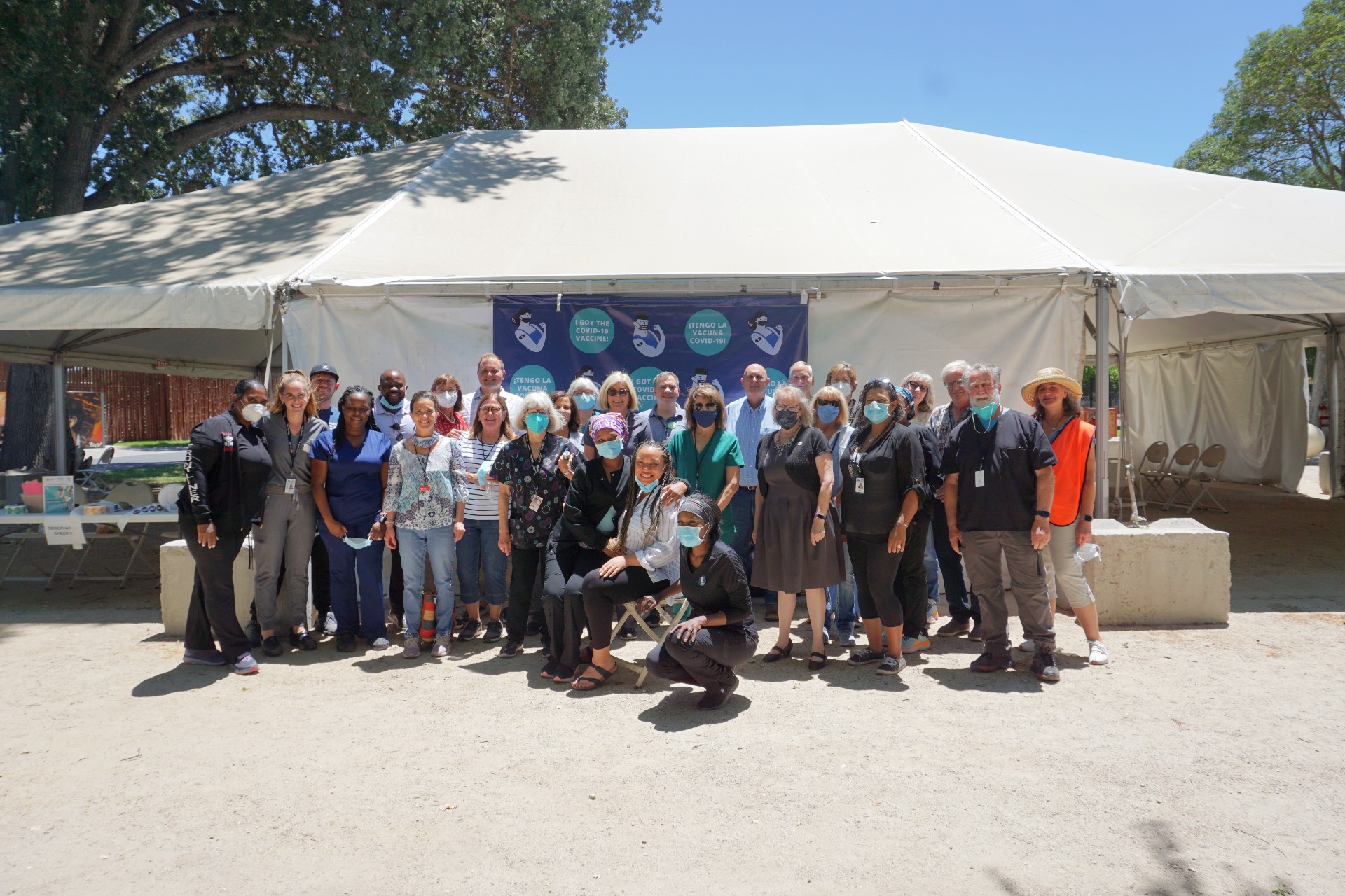 Group of Medical Reserve Corps Volunteers standing in front of a tent
