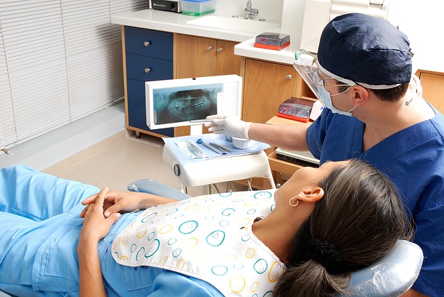 Dentist consulting a patient