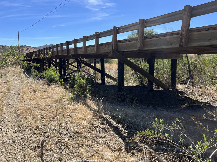 Wooden bridge over dry creekbed Click to view article, Road Closure For Bridge Repair Work On Arroyo Grande Huasna Road 