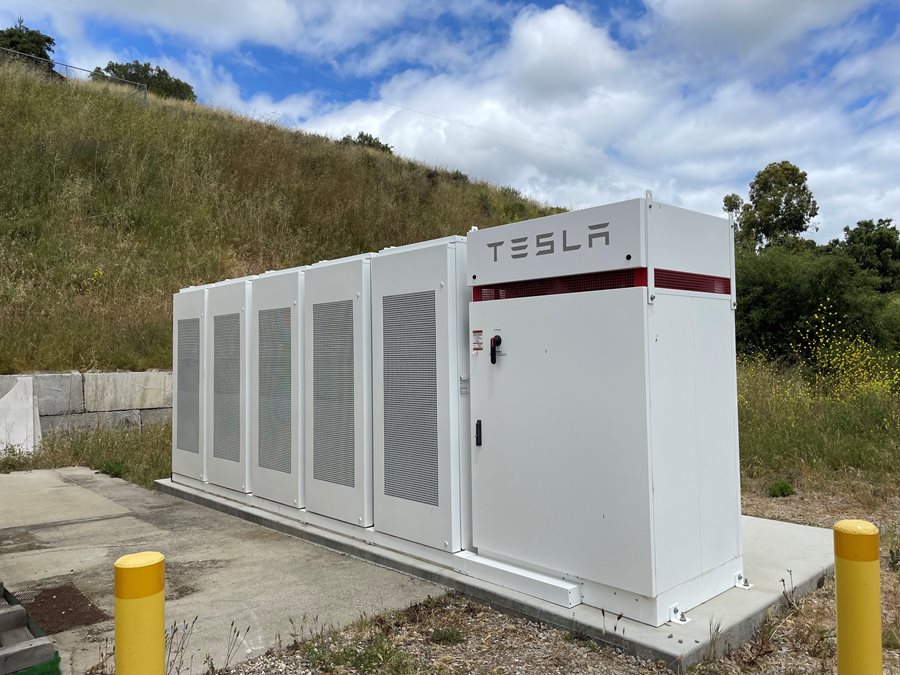 White rectangular battery storage system with TESLA on the front Click to view article, Energy Storage System Installed at Lopez Water Treatment Plant