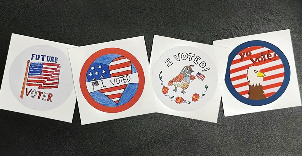 a photo of four round stickers with different designs that say "I voted" and "Future voter"
