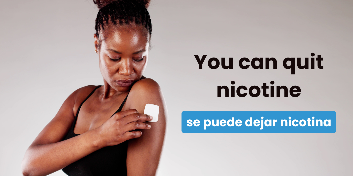 Woman applying nicotine patch to her left shoulder, looking down at her shoulder.