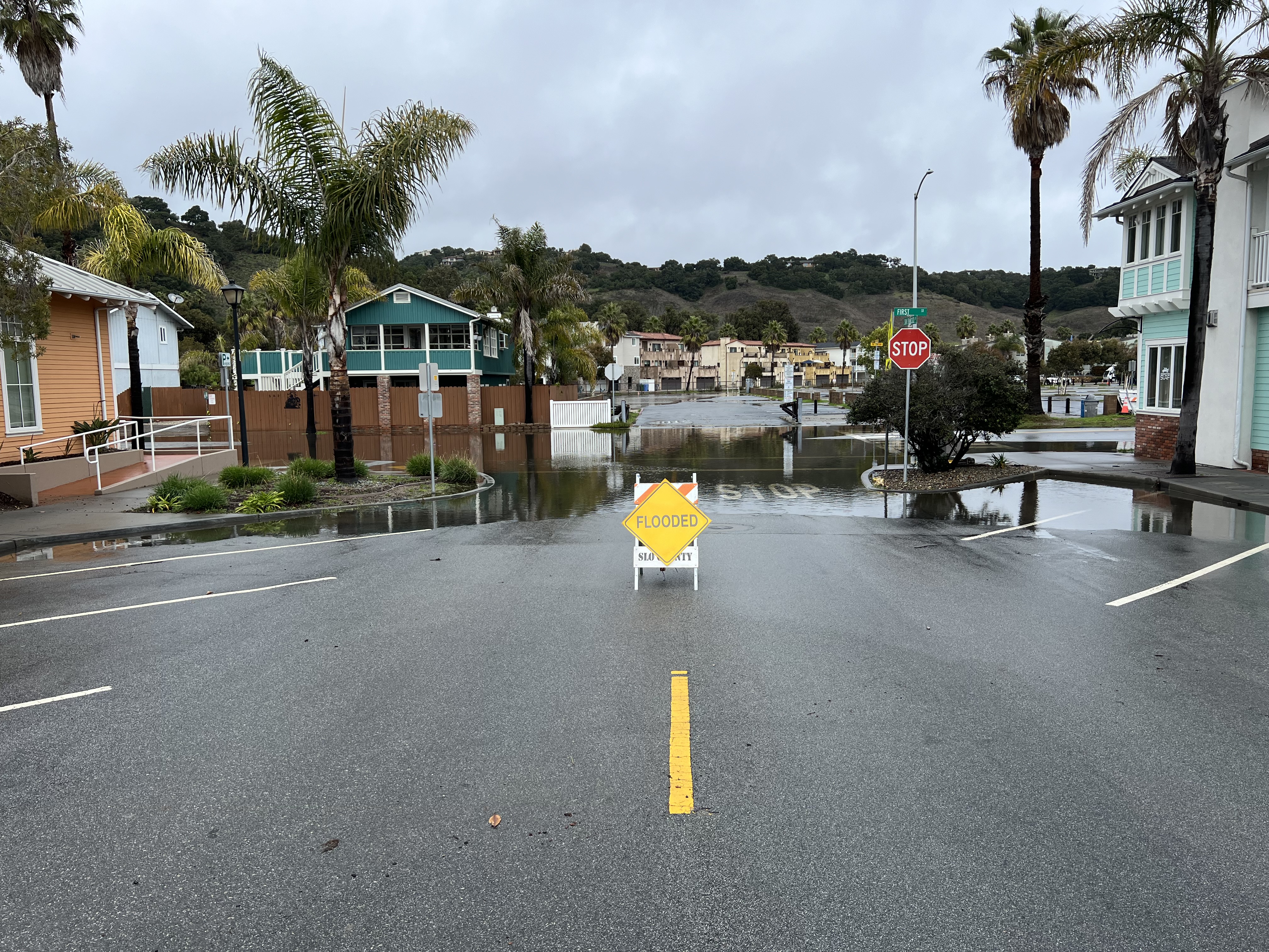 Flooded 1st Street Parking lot entrance view (1/24/24)