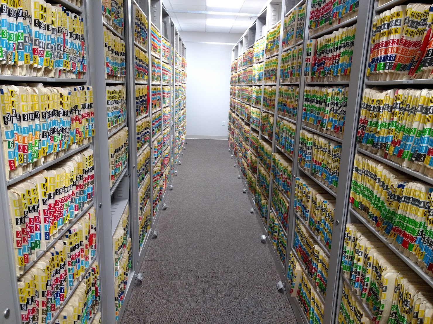 A small sample of rows and rows of paper files...