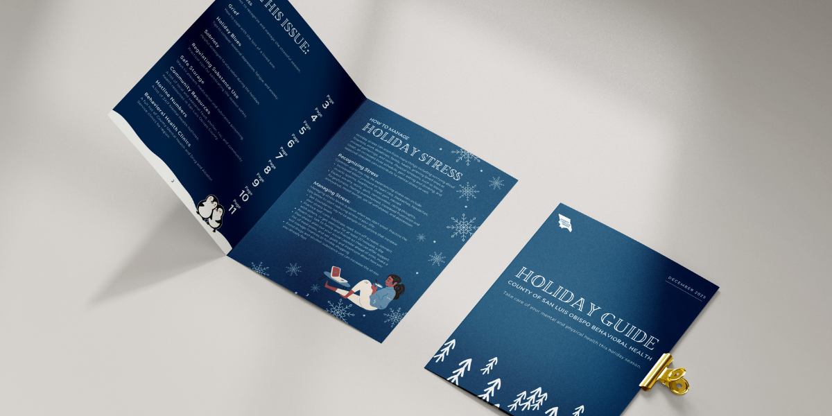 Printed Holiday Guide turned open to page that reads "How to Manage Holiday Stress."