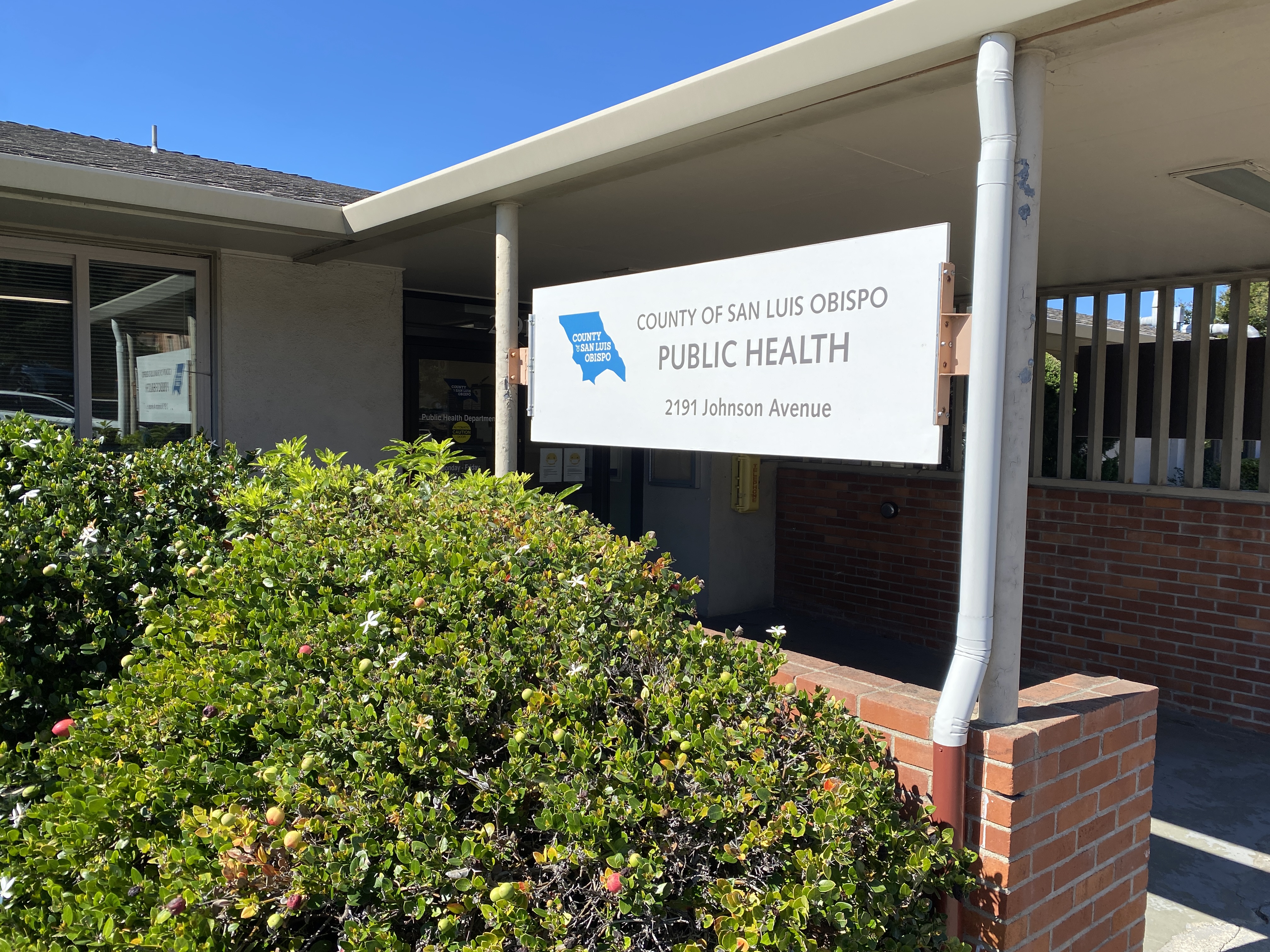Public Health Clinic signage by front entrance