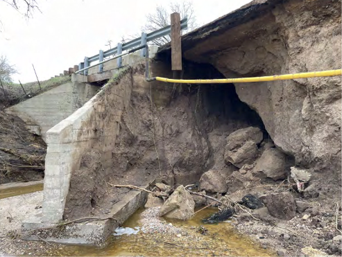 Broken portion of bridge over Quail Creek
