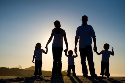Picture of a family at sunset